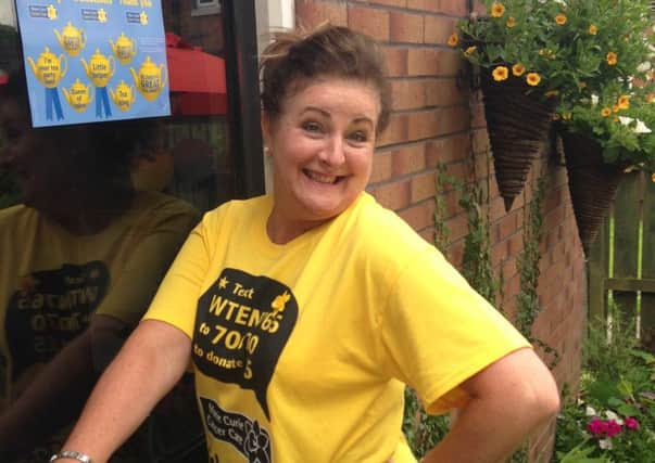 Audra Wright who held a tea party recently for Marie Curie and raised £850