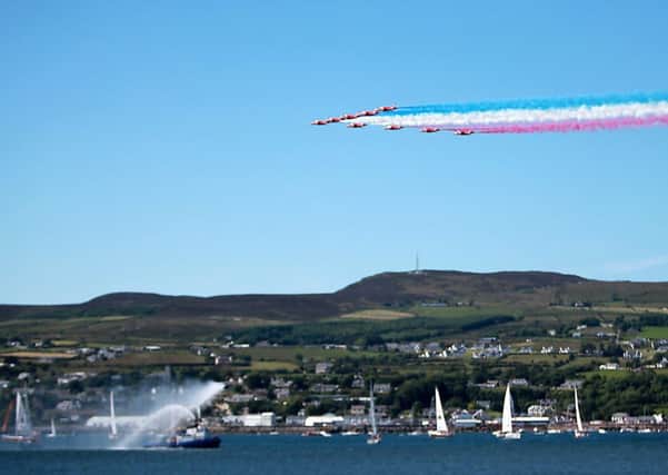 The RAF Red Arrows display team put on a breathtaking display on Sunday as they flew over the Magilligan and Greencastle area to see off the Clipper round the world yacht race. INLV2614-500KDR