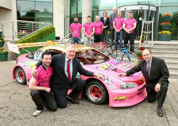 At Lagan Valley Island and promoting the John Christie Race Team fundraising efforts for Action Cancer are members of the cycling team; Cllr Jenny Palmer, Director, Adrian Donaldson and (front) John Christie, Cllr Pat Catney, Chairman of the Corporate Services Committee and Cllr John Palmer, Vice-Chairman.
