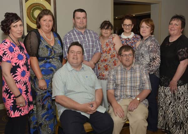 This group was pictured at the Something Special Summer Social in the White Horse Hotel, from left, seated, William O'Kane and Mark Kelly, standing, Marie McNicholl, Sinead McLaughlin, Peter O'Kane, Deirdre McAteer, Suzanne Grieve, Ann McGinnis and Margaret O'Kane. DER2614-170KM