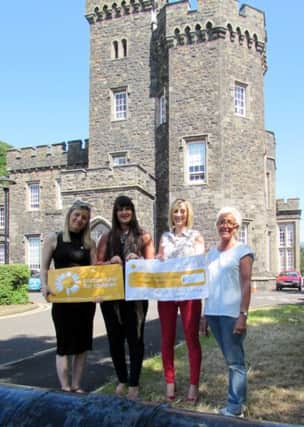 Ms Rebecca Spiers from Northern Ireland Cancer Fund for Children (left) receiving the cheque for £1011 from Miss Rachel Graham, Mrs Christina Blaney and Dr Fiona Lynch. INBM28-14 PHOTO BY KEVIN McAULEY