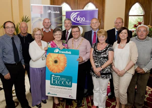 Pictured at the official launch of the 2014 Translink Ulster in Bloom Competition are (l-r) Ben Simon, Larne Borough Council, Charles Meban and Francis Wilson, Glenarm in Bloom, Neil Steward, Larne Borough Council, Cllr Evelyne Robinson MBE, NI Local Government Association Vice President, Tony Depledge, Translink Board Member, Cllr Martin Wilson, Mayor of Larne, Arthur Hamilton, Translink Area Manager, Rosaleen Meban, Glenarm in Bloom, Roger Esdale, Translink NI Railways Supervisor, Mandy Hall, Larne Borough Council and Jackie Wilson, Glenarm in Bloom.  INLT 28-675-CON