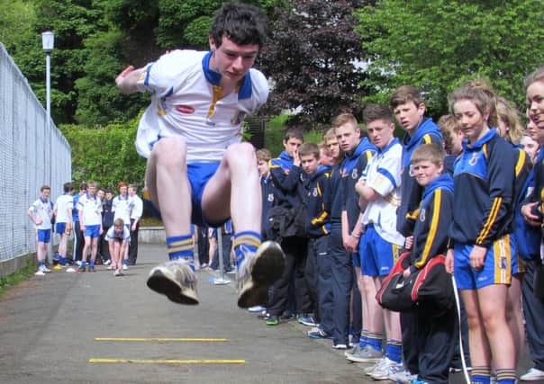 Peter McLoughlin taking part in the year ten long jump. INLT 28-656-CON