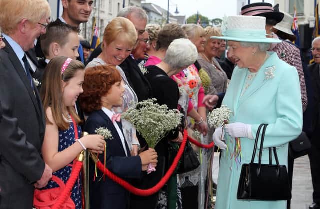 ROYAL ROTA POOL PICTURE 
Her Majesty The Queen and His Royal Highness The Duke of Edinburgh meet local people  in Coleraine Co Londonderry, after Her Majesty The Queen layed a wreath in honour of all those who died in WW1.Wednesday 25th June 2014.AFP:Paul Faith