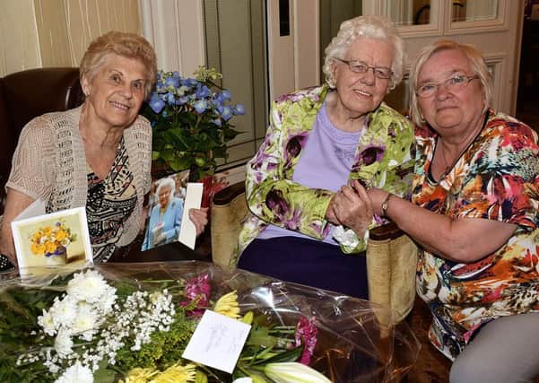 Miss Maud Nicholl is pictured celebrating her 105th birthday at a special celebration function in the Tullyglass House Hotel. Miss Nicholl is pictured with her cousin Maureen Luke and Cllr. Beth Adger. INBT28-207AC