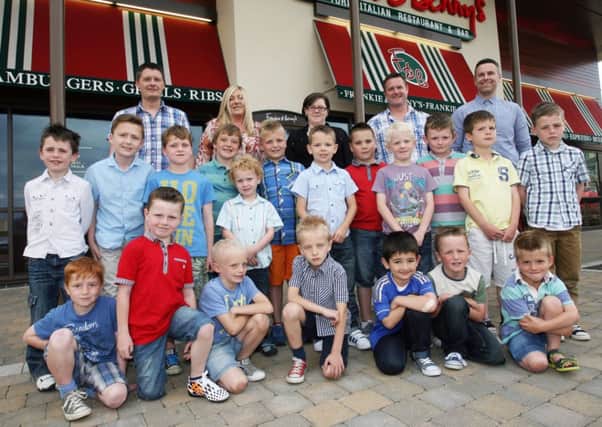 Members of Carniny Football Development Centre pictured at their recent prize giving held at Frankie & Bennys. Included are Carniny officials Linda Boyd (registration secretary), David Wylie (coach), Scott Wharry (coach) and William McDonald (coach). INBT28-201AC