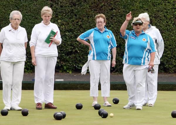 Ballymena bowlers Jennifer Dowds signals a good delivery from her team mate during their match with Londonderry. INBT28-202AC