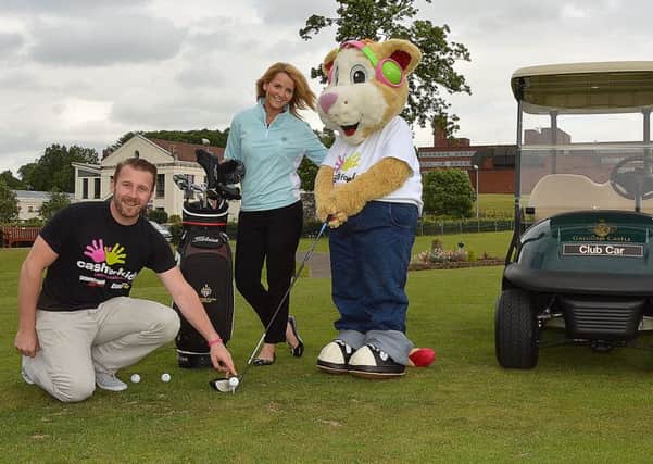 Darren Fowler Group Digital Fundraising and Donor Relationship Manager, Kirsty Worthington Sales & Marketing Manager at Galgorm Castle and Courage the Cat.