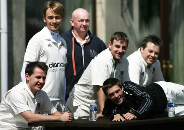 Members of Ballymena 2nds cricket team watching their team bat against Muckamore on Saturday. INBT28-254AC