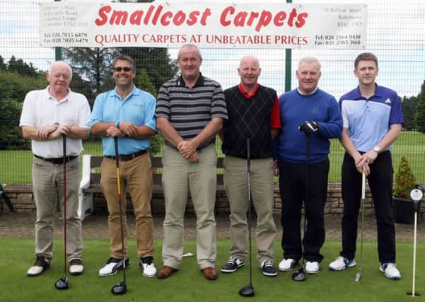 Ballymena Golf Club captain David Small with some of the competitors in the David Marcus Memorial competition. INBT27-254AC