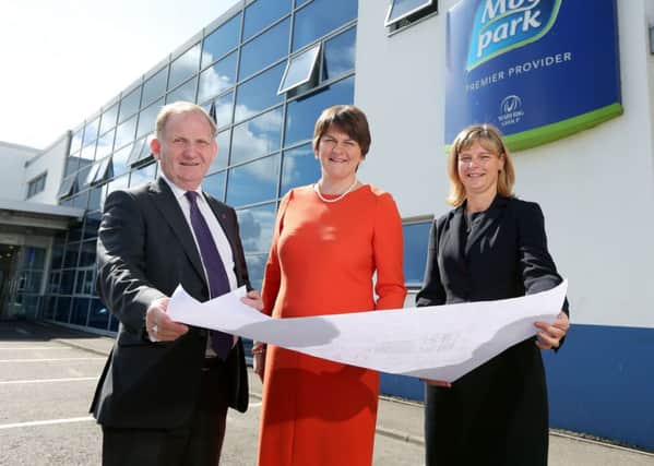 Enterprise Trade and Investment Minister Arlene Foster is pictured with Janet McCollum, chief executive of Moy Park, and Lord Morrow after announcing a £170m expansion by the company that will provide 628 new jobs across three sites, including Craigavon. INPT28-007