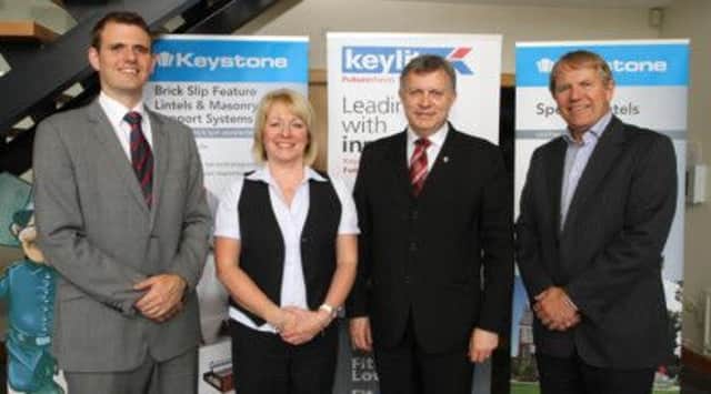Patsy McGlone with employees of Keystone Group including Eithne Kelly (Group MD) and Sean Og Coyle (Sales Director- Ireland).