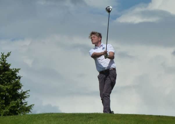 Conor Montgomery hits a drive during his Rossmore Cup match.