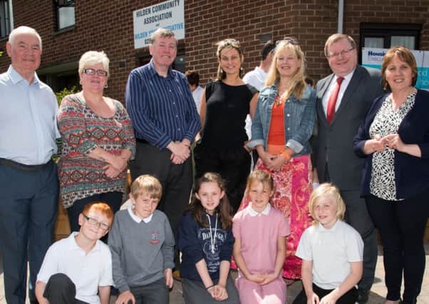 Pictured with some of the P7s from Forthill Integrated PS admiring the mosaic and garden are (l-r) Ivan Davis, Tricia McCormick (Hilden Community Association), Alderman Paul Porter, Lesley Wilson (Island Arts Centre), Mrs Jones (Forthill Integrated PS), Jonathan Craig MLA, and Jenny Palmer (Housing Executive Board Member and local Councillor)