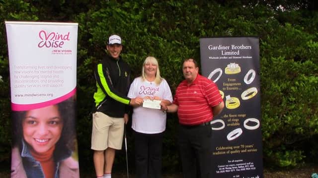 Pictured at the golfing event are Stephen Ferris, Gwynn Witherow, MindWise and organiser Raymond Gray. INCT 28-709-CON