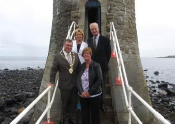 Audrey and Sean Mahony were given a tour of the Chaine memorial tower built to commemorate James Chaine. They were accompanied by Larne mayor Councillor Martin Wilson and mayoress Margaret. INLT 29-655-CON