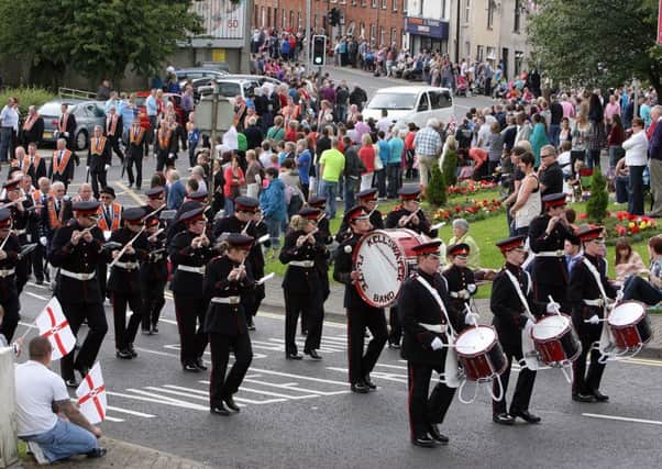 Members of Kellswater Flute Band marching at the Ballymena Twelfth. INBT28-338AC