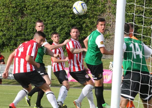 Derry City's Michael Duffy heads home their opening goal at Aberystwyth Town. Photo by Arwyn Parry Jones