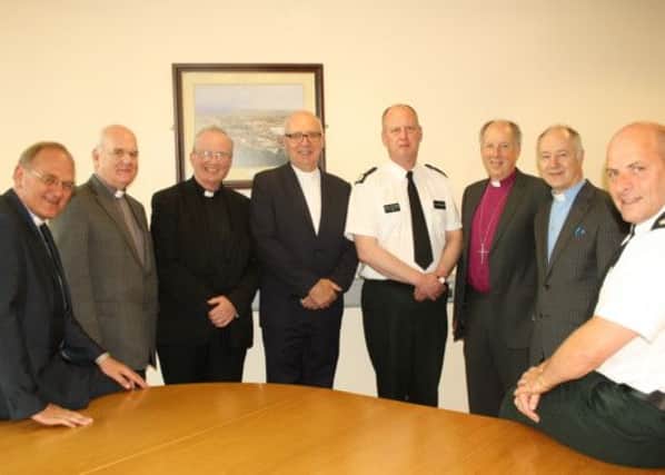 Rev Donald Kerr, Dr Donald Watts, Bishop Donal McKeown, Rev Dr Rob Craig, Bishop Ken Good and Rev Peter Murray, with PSNI Chief Constable George Hamilton and PSNI Chief Superintendent Stephen Cargin, Londonderrys Police Commander.