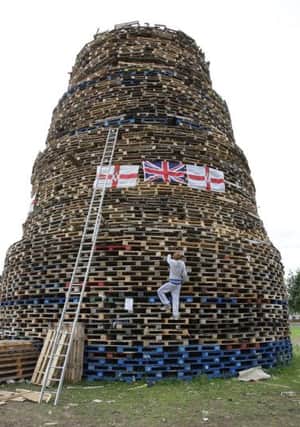 Work was continuing on Thursday morning on a huge bonfire being constructed at Ballymacash. Picture: Cliff Donaldson