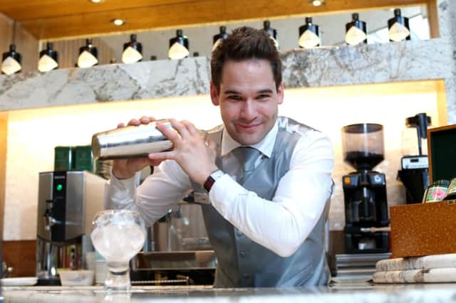 algorm's latest offering is a real tonic: Do you know your compounded from distilled? Do you prefer maceration to vapour infusion? Gin is enjoying something of a renaissance and with this in mind Galgorm Resort and Spa have more than 30 choices of heritage and artisan brands ready to serve by mixologist Jamie Geddis (pictured) in the luxurious surroundings of the Conservatory at the River Room, the latest addition to the four-star resort.
It's the perfect venue to experience the extensive gin list and signature cocktails, against the background of Galgorm's resident lounge singer.
Galgorm's latest offering is a real tonic
Gin Bar at exclusive £1million River Room expansion
Do you know your compounded from distilled? Do you prefer maceration to vapour infusion? Gin is enjoying something of a renaissance and with this in mind Galgorm Resort and Spa have more than 30 choices of heritage and artisan brands ready to serve in the luxurious surroundings of the Conservatory at the River Room, the latest addition to