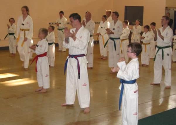 Members of the Taekwondo Association of Great Britain Ballymena Club pictured during their recent grading event, held in the Seven Towers Leisure Centre.