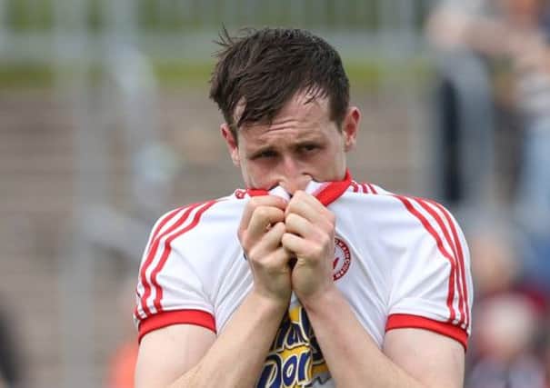 ©Press Eye Ltd Colm Cavanagh of Tyrone looks dejected at the end of the game