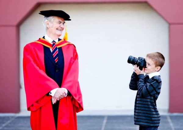 A proud day for 78 year old George Mc Bride from Banbridge, PhD Graduate from the University of Ulster, Coleraine, as he celebrates with his grandson Christopher.