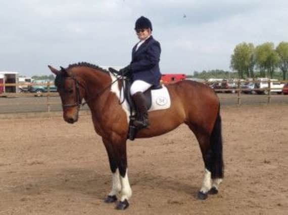 Omagh Rider and Fermanagh Resident Zoe O'Malley with her Horse Lucy K at the RDA NI Dressage Championships
