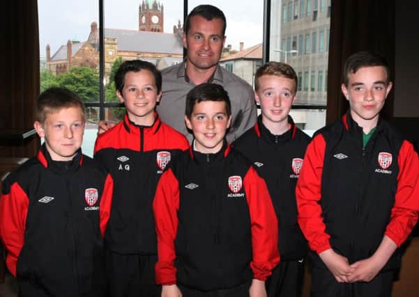 Aston Villa and Republic of Ireland International goalkeeper Shay Given pictured with some of the yound Derry City Academy players during the recent Hughes Insurance Foyle Cup Launch at the City Hotel. DER2214MC007