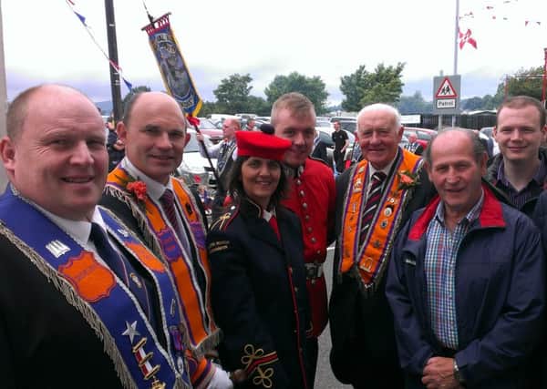 Unionist politicians taking part in the six minute protest during the Twelfth demonstrations in Larne. Pictured (l-r) are Cllr Gregg McKeen (DUP), Roy Beggs MLA (UUP), Cllr Ruth Wilson (TUV), Cllr Mark McKinty (UUP), Ald Roy Beggs Snr (UUP), Ald Winston Fulton (DUP) and Cllr Gordon Lyons (DUP). INLT 29-676-CON