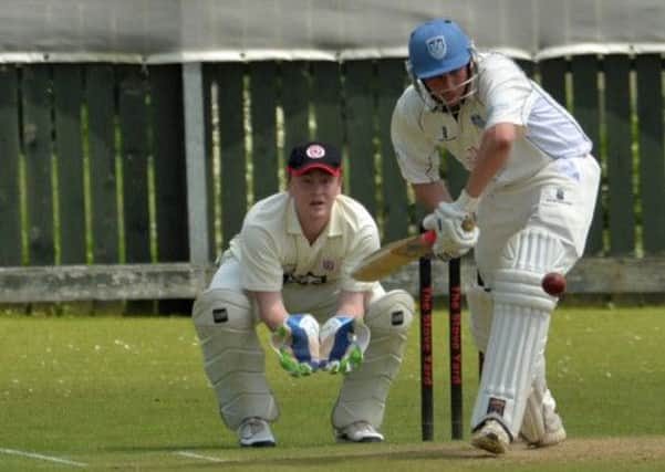 Iain Parkhill in action for Carrickfergus Cricket Club.