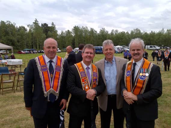 Lisburn City Council's Alderman James Tinsley, Bro Jeffrey Donaldson MP, First Minister Peter Robinson and  Lisburn City Councillor Bro Thomas Beckett pictured in the demonstration field at Ballinderry.
--