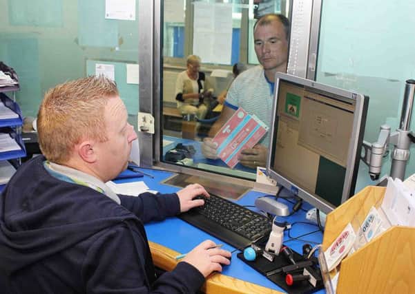 A member of the public taxes his car for the last time at the DVA Offices in Coleraine today (Thursday). In future cars will be able to taxed online or at any Post Office. Due to closing down and big job loses the main centre will be in Swansea.PICTURE MARK JAMIESON.