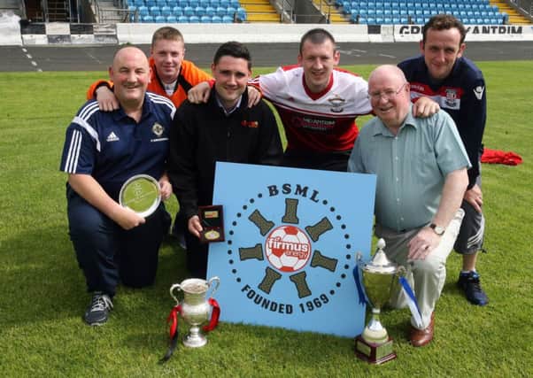 David Fuscoe, of Firmus Energy, the new sponsors of the Ballymena Saturday Morning League, is pictured with league officials David King (Chairman) and Brian Montgomery (secretary). Included are Garry Bonnes (Harryville Homers), Mark McKelvey (Connor) and Chris Coulter (Cullybackey Olympic. INBT30-203AC