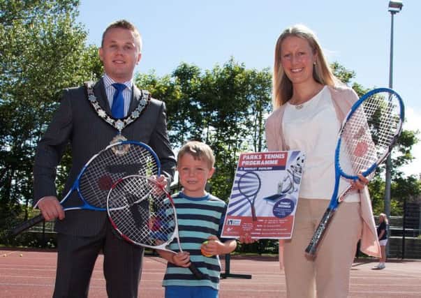 Launching the Parks Tennis Programme at Mossley Pavilion for children aged 6-17 years are (L-R): Mayor of Newtownabbey Alderman Thomas Hogg, six year old Josh Sandford, and Lauren Smythe from Ulster Tennis. INLT 30-905-CON