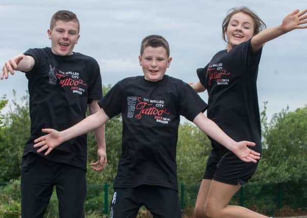 Irish Dancers Ben,  Josh and Molly McHugh from Dungannon who will be performing in the 2014 Walled City Tattoo at Ebrington Square in Derry-Londonderry from the 27th to the 30th of August. Picture Martin McKeown. Inpresspics.com.
