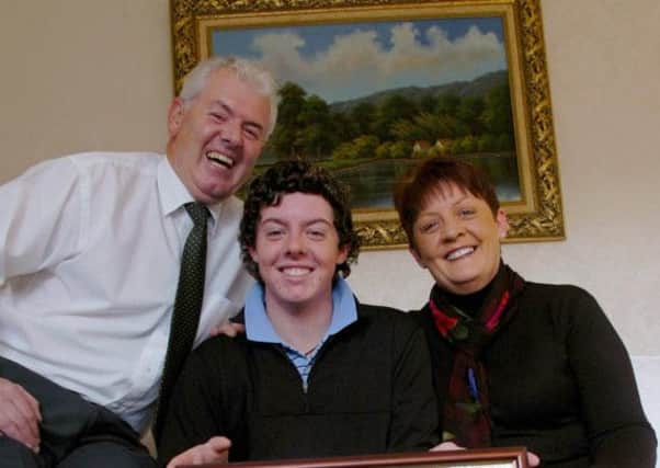 PACEMAKER PRESS INTERNATIONAL, BELFAST, 
Rory McIlroy pictured at home in Holywood with Dad, Gerry and Mum Rosie.
Picture Charles McQuillan/Pacemaker.
26/2/2012  Rory plays in the final of the accenture World Match play this evening. If he wins the tournament he becomes World Number 1.
