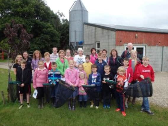 A good turnout for the recent Biodiversity Hunt held at Brian Knipes Vowgarve dairy farm on the Vow Road with Ballymoney Borough Council organisers Sonya Crawford, Countryside Access Officer and Rachel Bain, Biodiversity Officer (pictured back left.). INBM31-14S