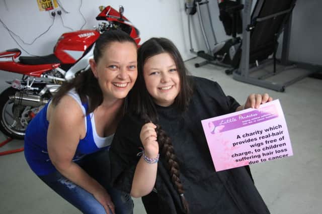 Jordanne McAlister from Ballyacstle who turns 14 on Thursday has lost over 15Inches of her hair for Charity, Jordanne and her mum Noelle are pictured getting ready for the chop!