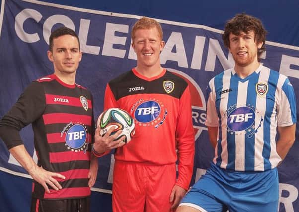 Neil McCafferty, Eugene Ferry and Howard Beverland reveal the 2014-15 Coleraine F.C. away and home strips by Joma. (s)