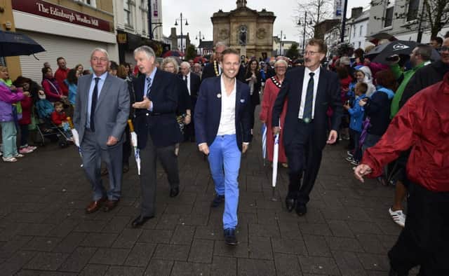 Special guest and former Westlife Singer Nicky Byrne, who also played in The Milk Cup on three occasions, makes his way through the streets of Coleraine during Sunday evening's opening ceremony. 

©Russell Pritchard / Milk Cup
