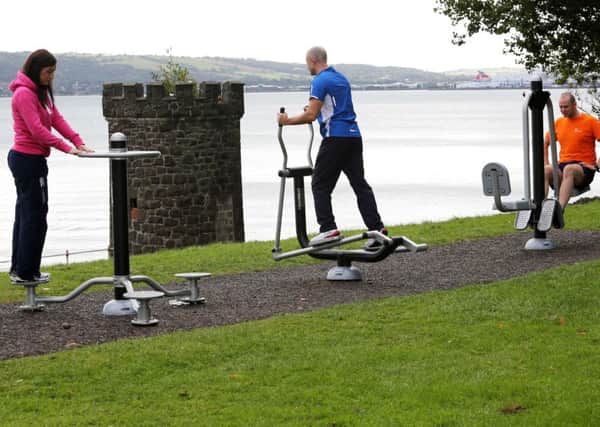 Making use of the outdoor gym equipment at Hazelbank Park. INNT 31-509CON