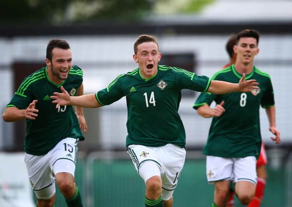 Northern Ireland's Sean Mullan celebrates scoring against China