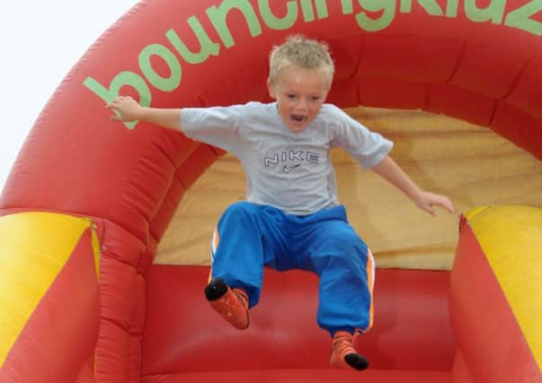 Alan enjoys his time on the slide at sallagh Park  INLT 31-220-AM