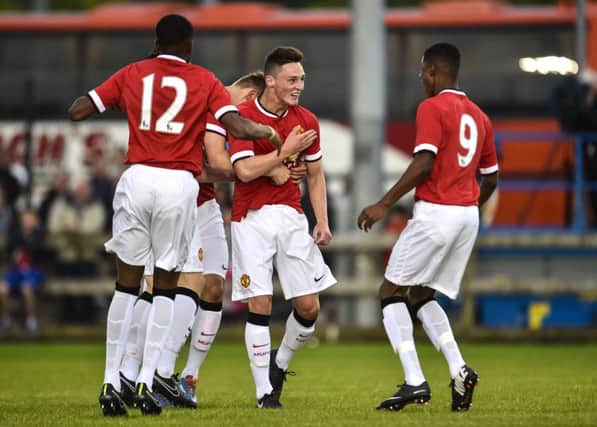 Man Utd's goalscorer Jordan Andrew Thompson celebrates against Co Armagh. Picture: Russell Pritchard