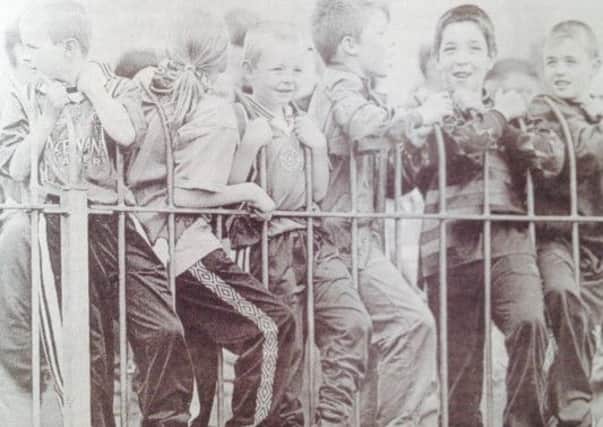 Young fans at Ballyclare Comrades' pre-season friendly against Glasgow Rangers at Dixon Park in 1997. INLT 31-903-CON