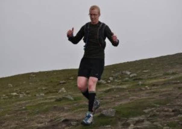 Taking part in Trilimits Donard Dozen Challenge completing 10 laps in 33hrs June 2013