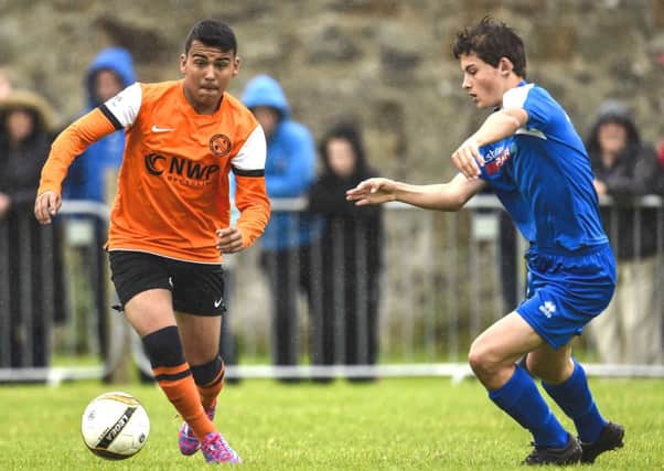 Co 
Armagh's Pablo Andrade on the ball against Fermanagh.