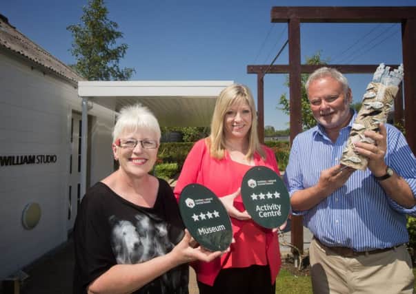 Caroline Adams, NITB Quality & Standards Manager (centre) presents Deirdre Quail, FE McWilliam Gallery and Trevor Woods, Mount Ida Pottery with their four star awards.